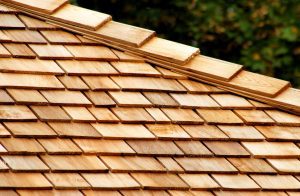 Up-close view of stunning cedar shake roofing on a home